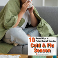 Sick woman on sofa blowing nose with a tissue with overlay: 14 Natural Ways to Protect Yourself from the Cold & Flu Season