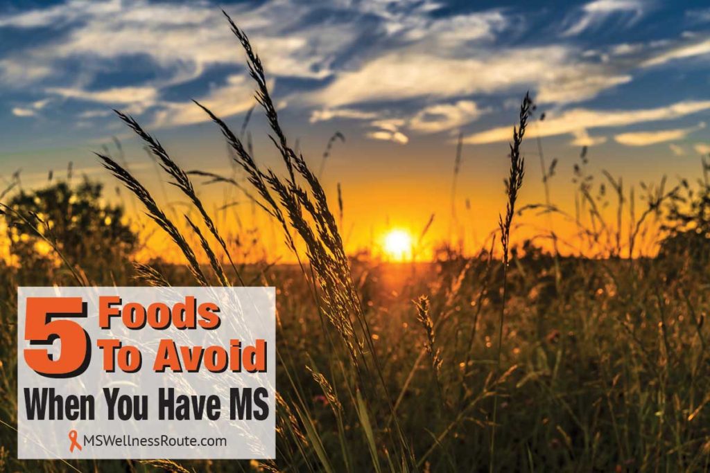 Sunset behind a wheat field with overlay: 5 Foods to Avoid When You Have MS