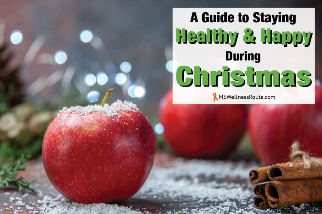 Red apples and cinnamon sticks with overlay: Staying Healthy and Happy During Christmas