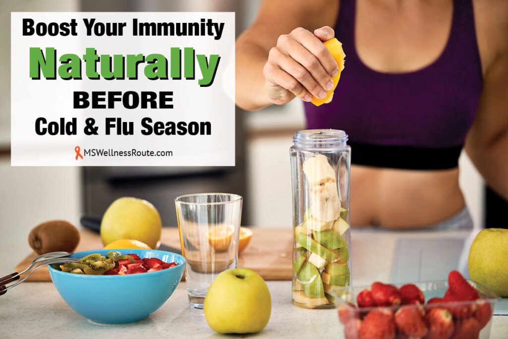 Closeup of woman using lemon while making fruit smoothie with overlay: Boosting Immunity Before Cold & Flu Season