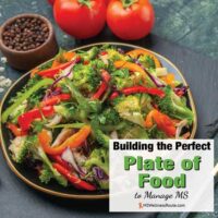 A large plate of salad with overlay: Building the Perfect Plate of Food to Manage MS