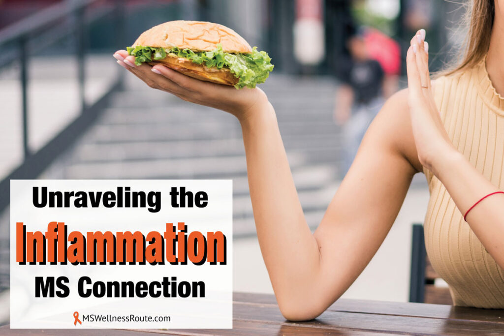 Woman holding burger not satisfied with overlay: Unraveling the Inflammation MS Connection.