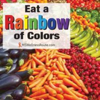 Colorful fruit and vegetables with overlay: Eat a Rainbow of Color