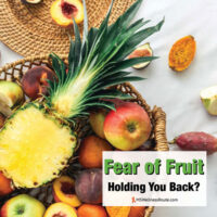 Top view of exotic fruits in a basket with overlay: Fear of Fruit Holding You Back?