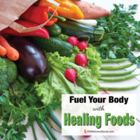 Groceries spilling out of a paper grocery bag with overlay: Fuel Your Body With Healing Foods