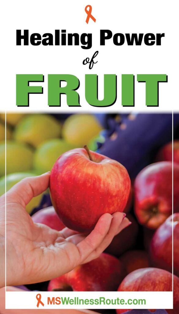 Woman holding an apple at the market with headline: Healing Power of Fruit