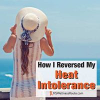 Woman holding hat overlooking ocean with overlay: How I Reversed My Heat Intolerance