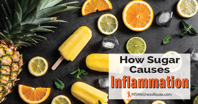 A pineapple, citrus fruits and popsicles laying on table with overlay: How Sugar Causes Inflammation