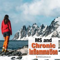 Woman standing near shore looking at snowing rocky mountains with overlay: MS and Chronic Inflammation