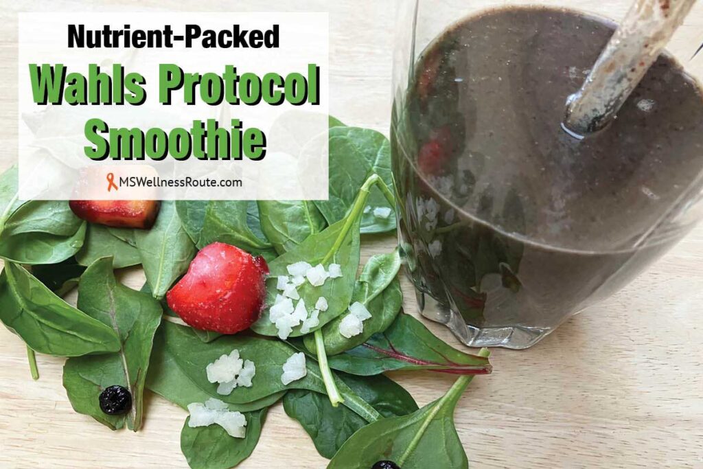 Smoothie with leafy greens and berries with overlay: Nutrient-Packed Wahls Protocol Smoothie.