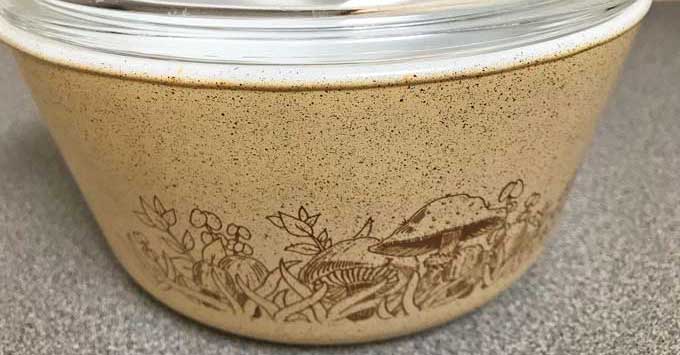 Close-up of mushroom pattern on an old CorningWare cookware.