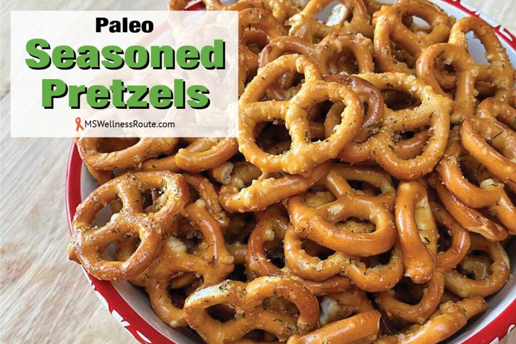 Bowl of seasoned pretzels with overlay: Paleo Seasoned Pretzels.