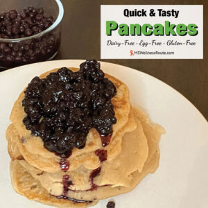 A stack of pancakes with blueberries on top with overlay Quick & Tasty Pancakes, dairy-free, egg-free, gluten-free