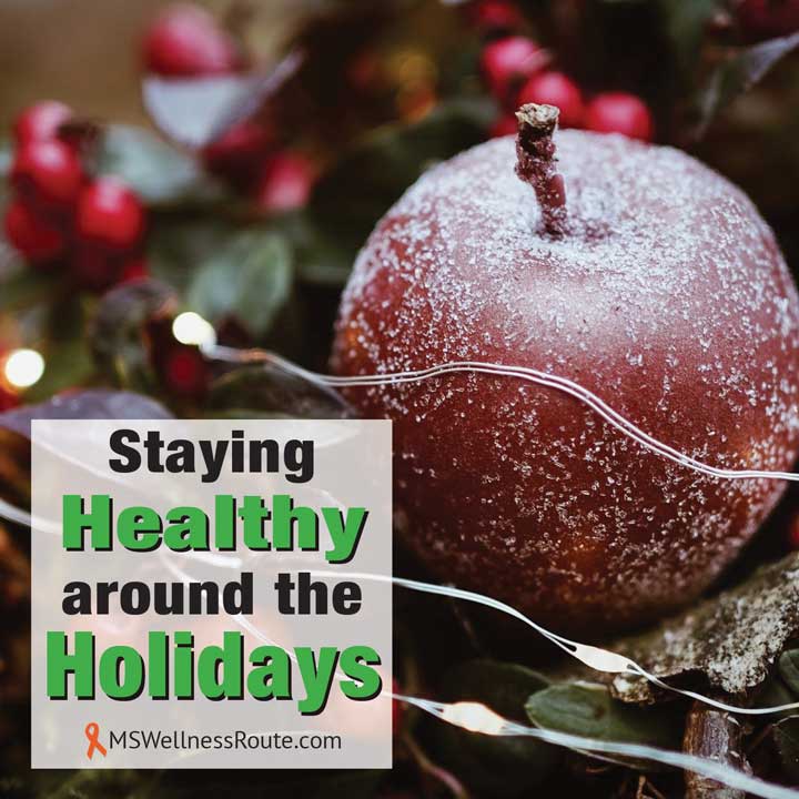 Christmas display of apple with overlay: Staying Healthy around the Holidays