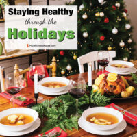 Christmas dinner party with overlay: Staying Healthy through the Holidays