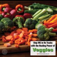 A cutting board with vegetables with overlay: Stop MS in it's Tracks with the Healing Power of Veggies