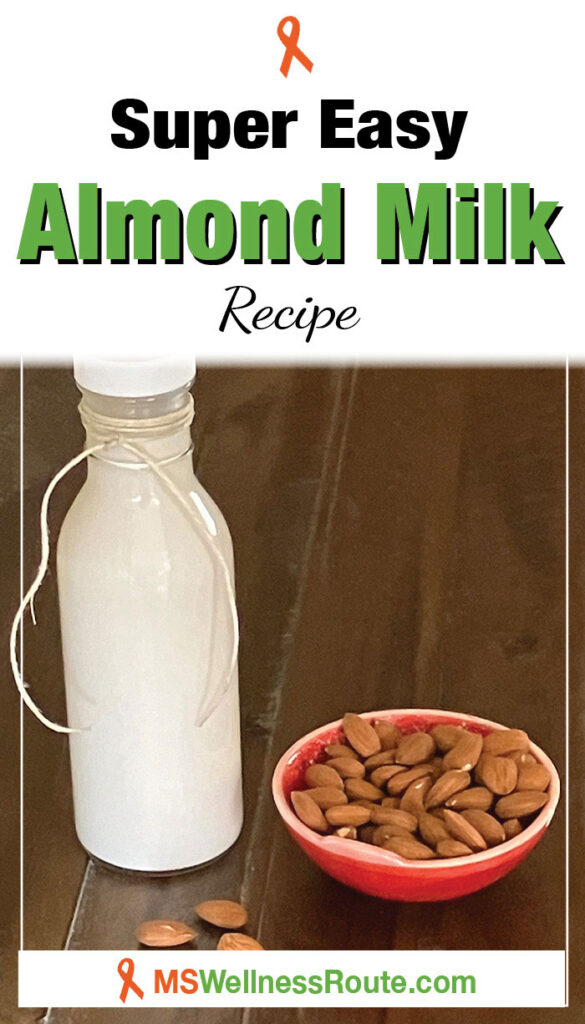 Glass bottle of almond milk with almonds and overlay: Super Easy Almond Milk Recipe