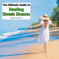 Young woman in white dress and hat walking on a beach with overlay: The Ultimate Guide to Healing Chronic Diseases