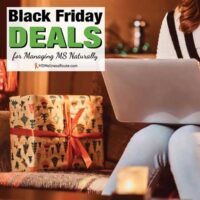 Woman on sofa with laptop and Christmas present with overlay: Black Friday Deals for Managing MS Naturally