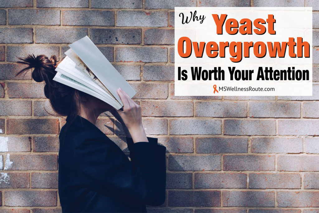 Woman hiding her face under a book with overlay: Why Yeast Overgrowth Is Worth Your Attention