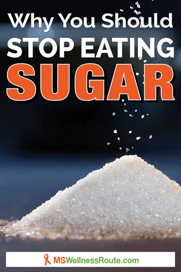 A Pinterest pin with image of a pile of sugar with heading: Why You Should Stop Eating Sugar