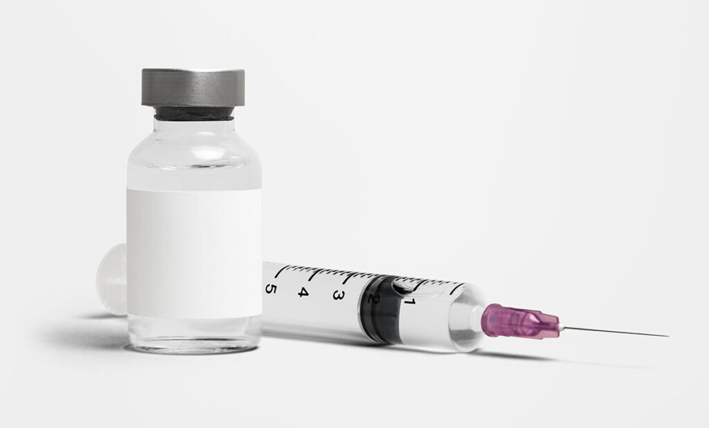 Blank white label injection bottle glass vial with syringe.