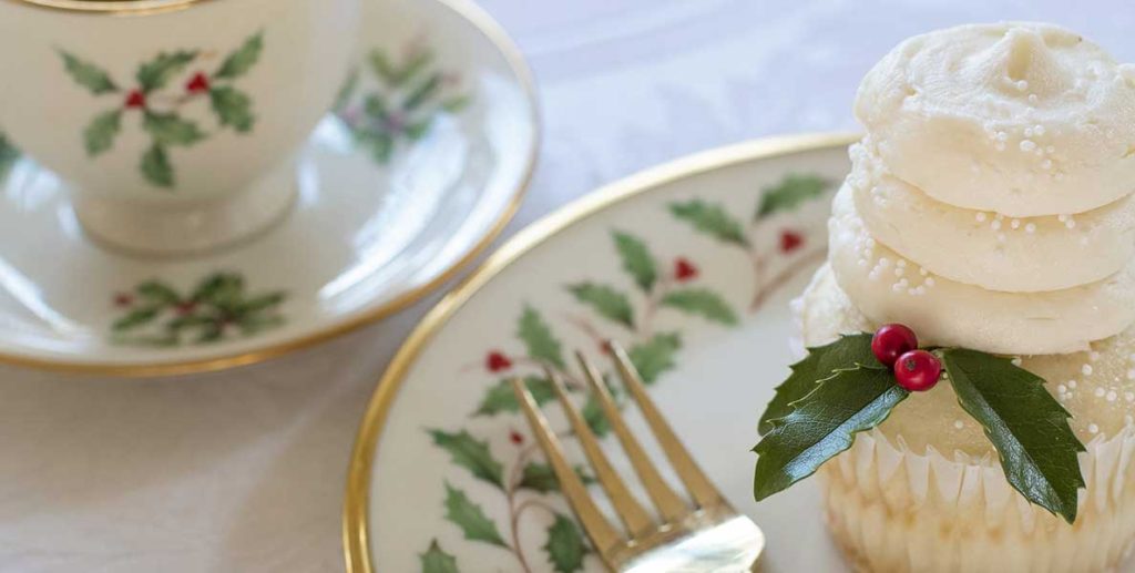 Cupcake with holly on holly plate plus a holly cup and saucer.