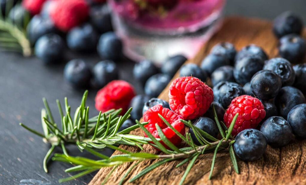 Blueberries, raspberries, and thyme.