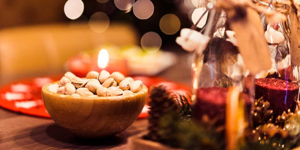 Pistachio bowl on Christmas table.