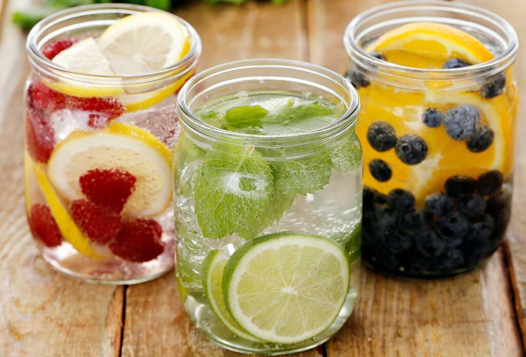 Three different flavored water on a table.