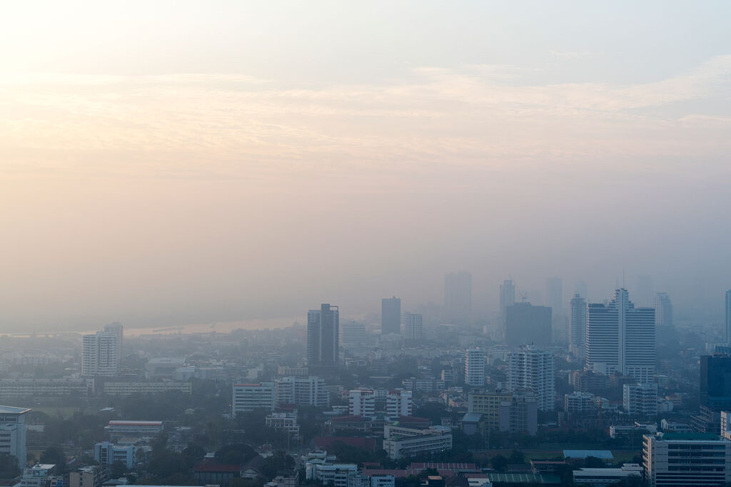 View of cityscape with inversion. 