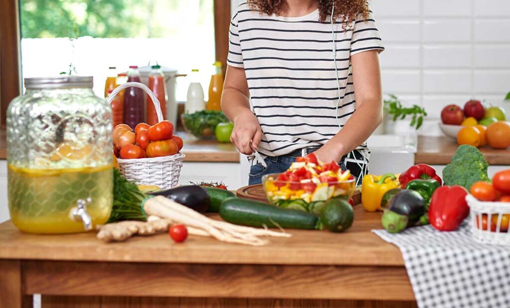 Woman cooking listening music.