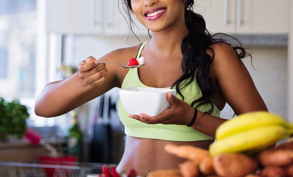 Woman eating healthy to fight EBV.