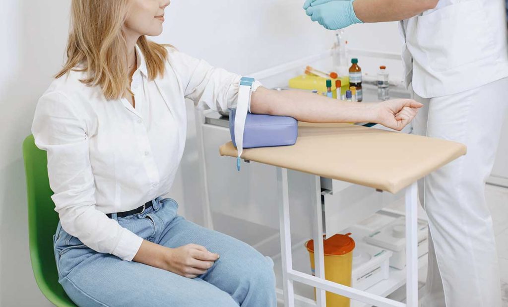 woman getting blood work