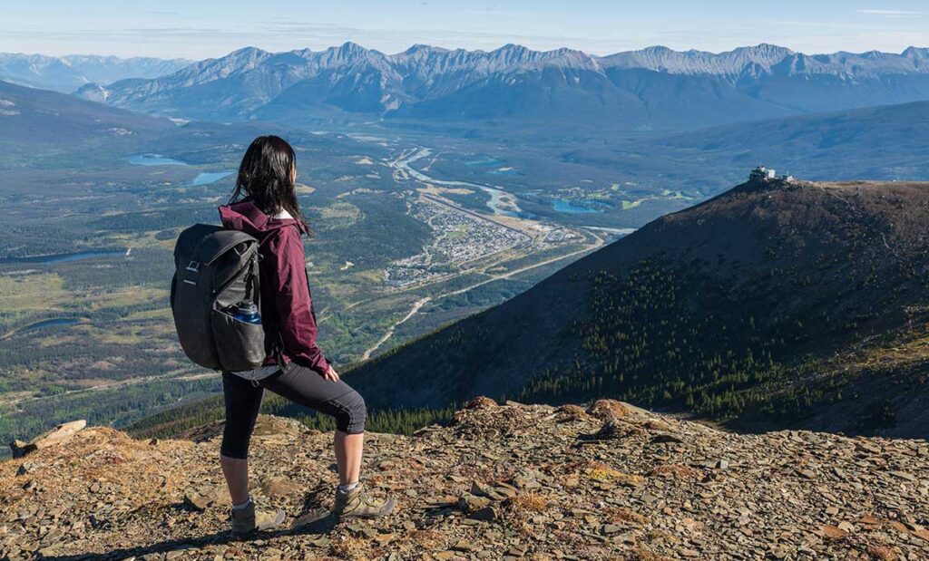 Woman overlooking scenic view.